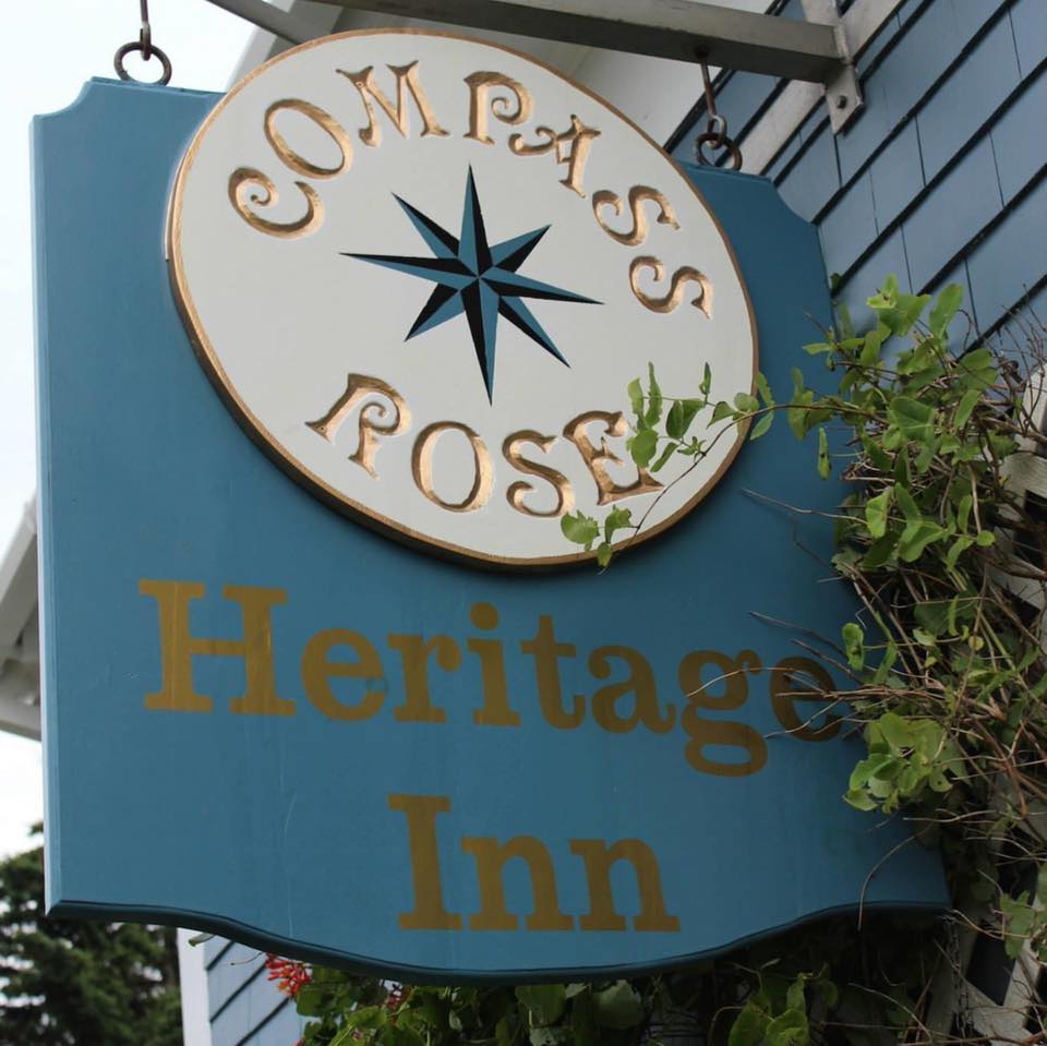 Compass rose heritage inn sign.