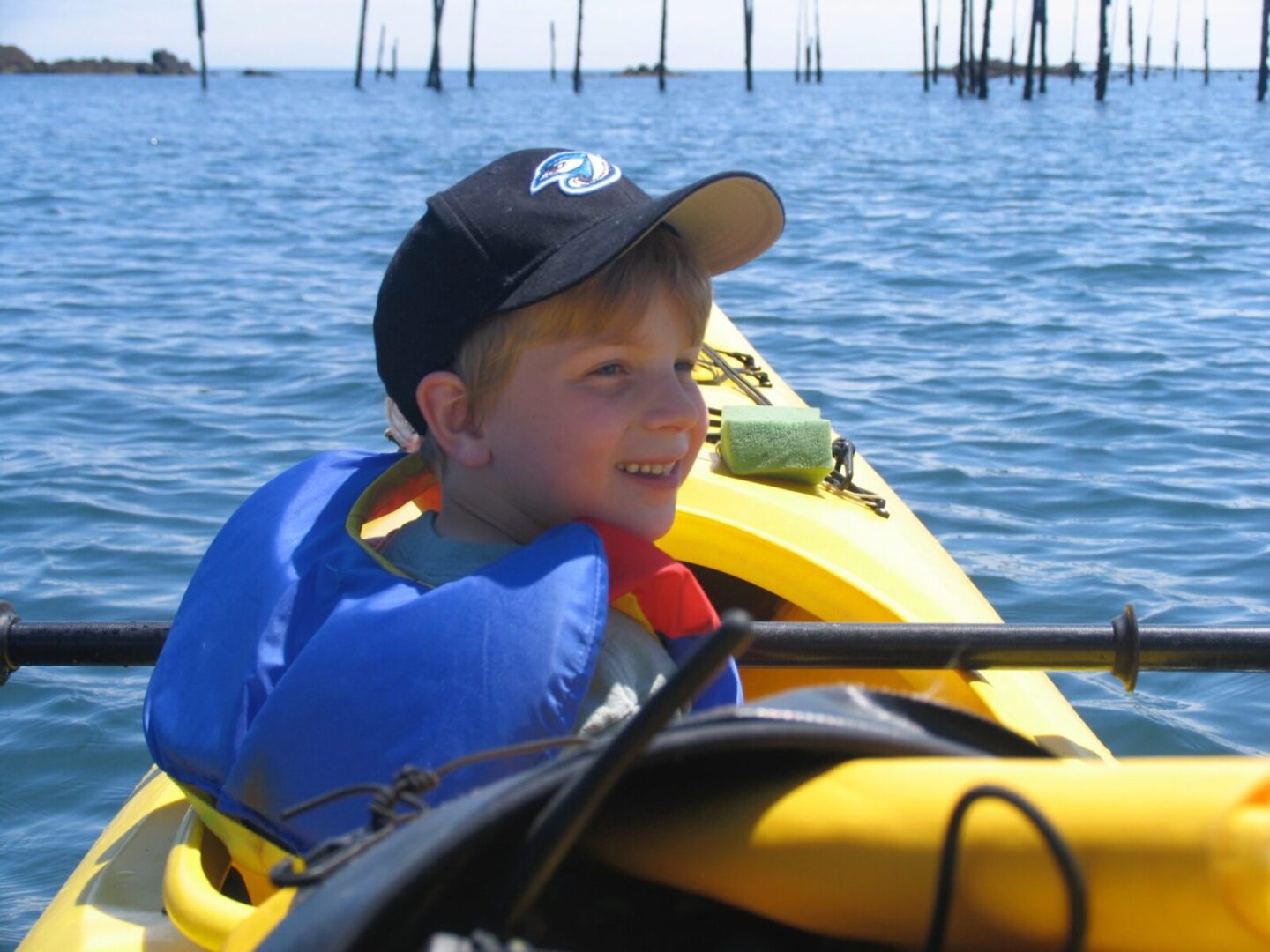 A boy in a kayak.