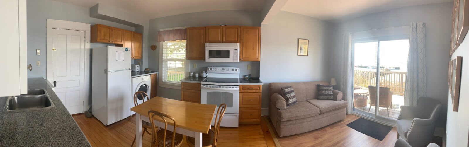 A view of a kitchen and living room.