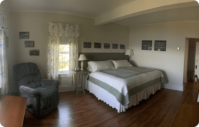 Cozy bedroom with a large bed.