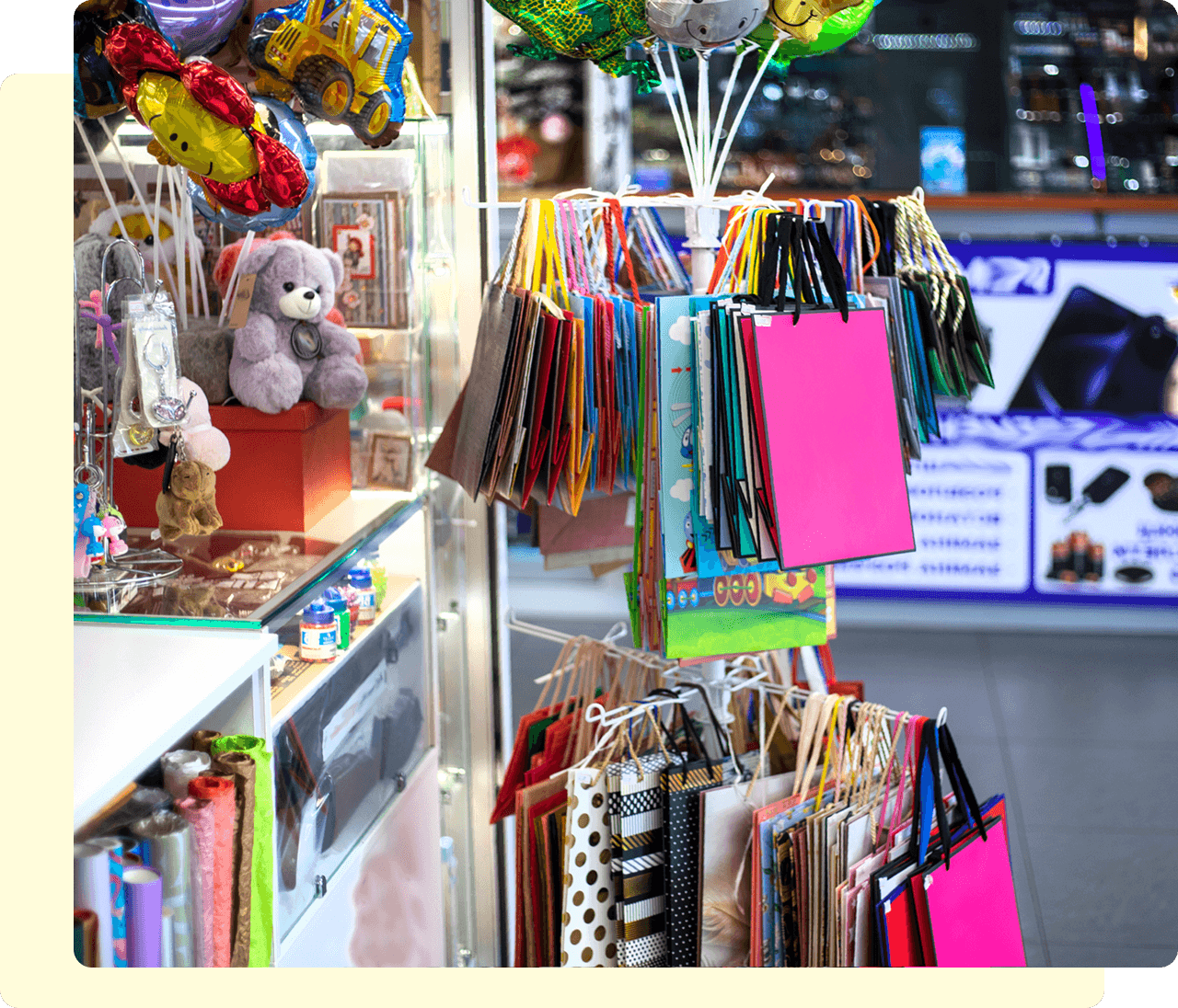 Gift shop with bags and plush toys.
